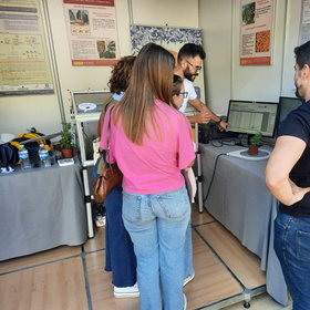 Our workmates explaining the RFID system during science week 2023